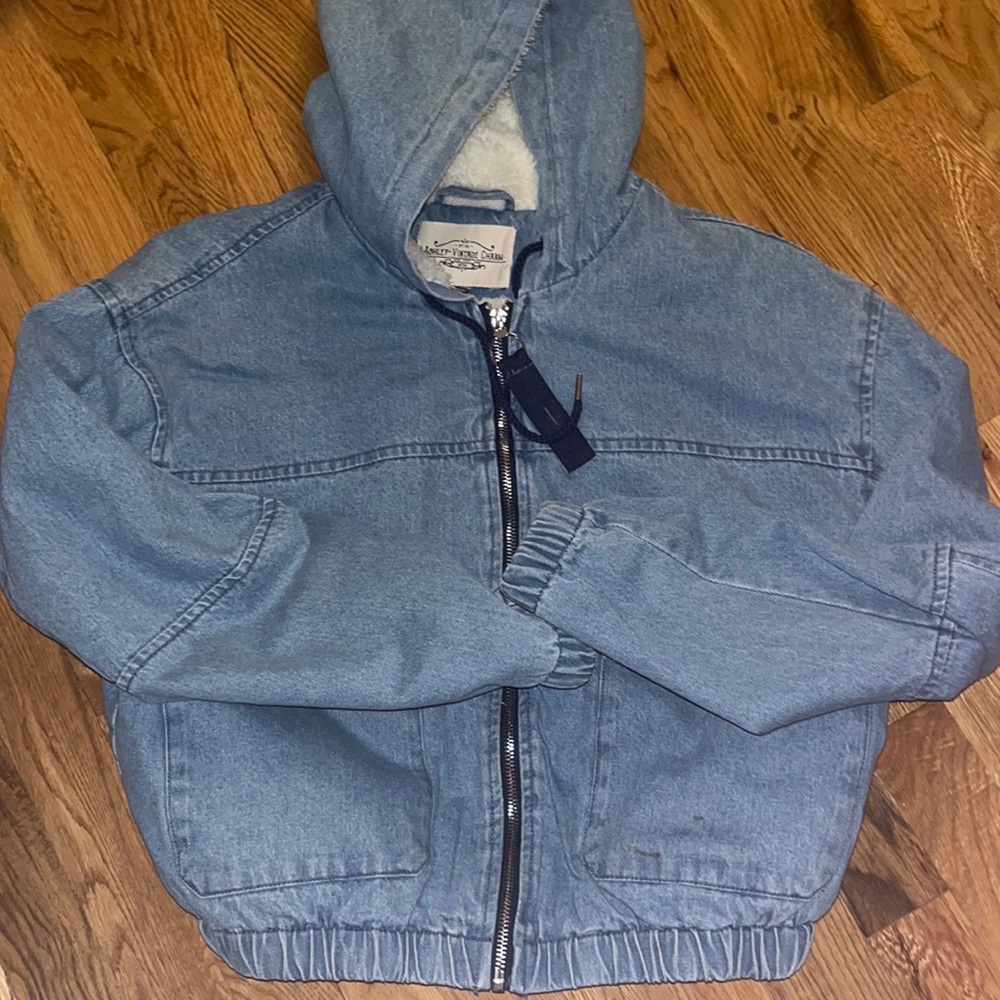 Super cute and trendy Jean jacket on the outside warm on the inside! Size Large!
